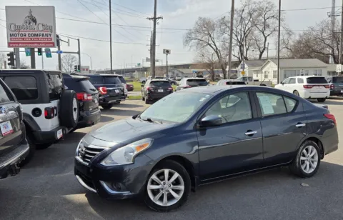 Gray 2015 Nissan Versa SL for sale in Des Moines, IA
