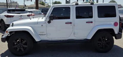 More photos of 2015 Jeep Wrangler Unlimited Sahara at Capital City Motor Company, IA
