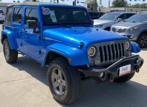 Photos of 2015 Jeep Wrangler Unlimited Freedom Edition for sale in Des Moines, IA at Capital City Motor Company
