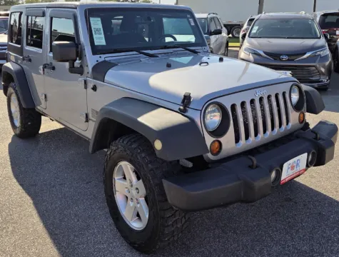 Photos of 2013 Jeep Wrangler Unlimited Sport for sale in Des Moines, IA at Capital City Motor Company