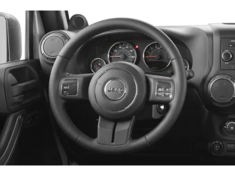 Photos of 2015 Jeep Wrangler Unlimited Sport for sale in Des Moines, IA at Capital City Motor Company