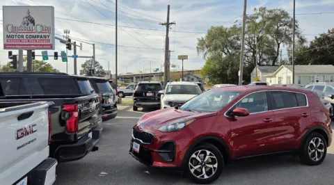 Red 2022 Kia Sportage LX for sale in Des Moines, IA