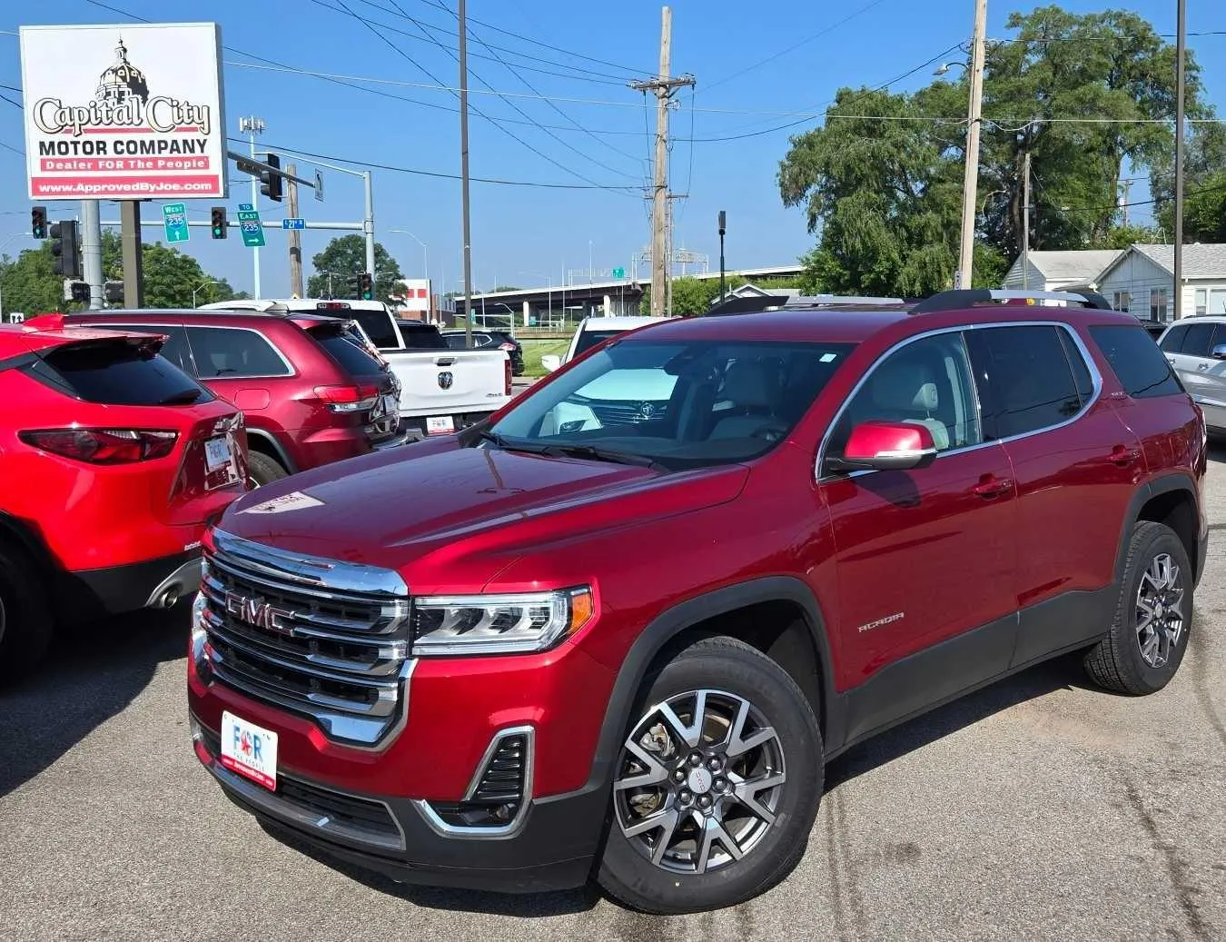 Red 2023 GMC Acadia SLT for sale in Des Moines, IA