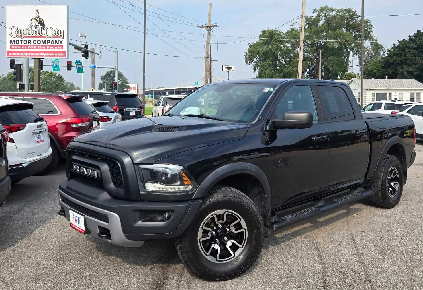 Black 2015 Ram 1500 Rebel for sale in Des Moines, IA
