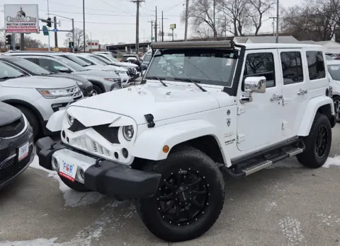 White 2015 Jeep Wrangler Unlimited Sahara for sale in Des Moines, IA