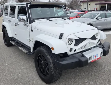 Photos of 2015 Jeep Wrangler Unlimited Sahara for sale in Des Moines, IA at Capital City Motor Company