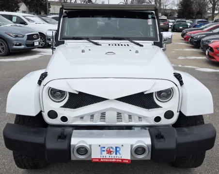 Another view of 2015 Jeep Wrangler Unlimited Sahara for sale in Des Moines, IA at Capital City Motor Company
