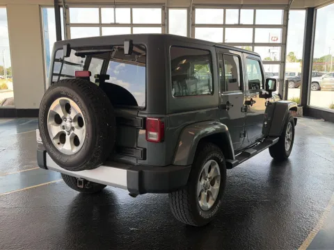 More photos of 2015 Jeep Wrangler Unlimited Sahara at Pat Clemons Inc., IA