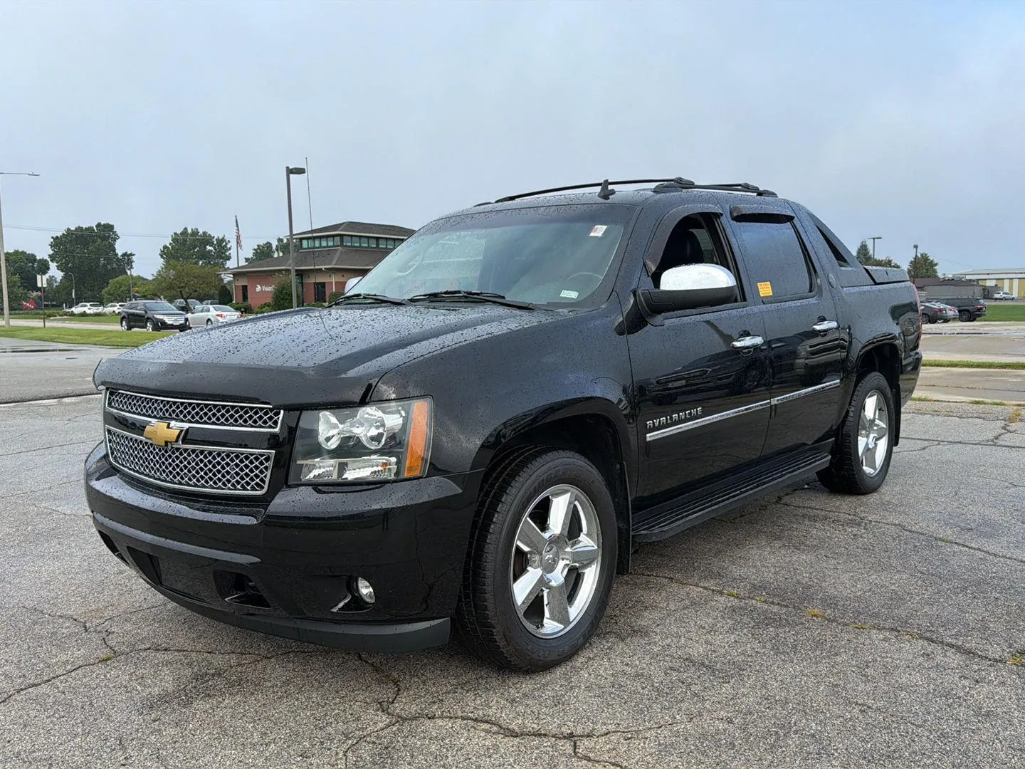 Black 2013 Chevrolet Avalanche LTZ for sale in Boone, IA