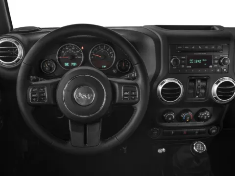 Photos of 2016 Jeep Wrangler Unlimited Sahara for sale in Boone, IA at Pat Clemons Inc.