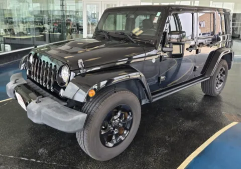 Black 2015 Jeep Wrangler Unlimited Altitude for sale in Boone, IA