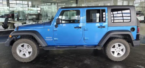 Photos of 2010 Jeep Wrangler Unlimited Sport for sale in Boone, IA at Pat Clemons Inc.