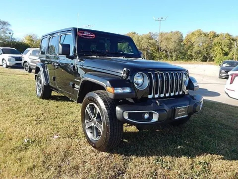 Black 2023 Jeep Wrangler Sahara for sale in Kansas City, MO