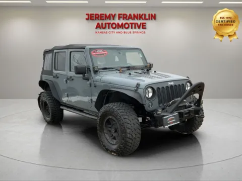 Gray 2015 Jeep Wrangler Unlimited Sport for sale in Blue Springs, MO