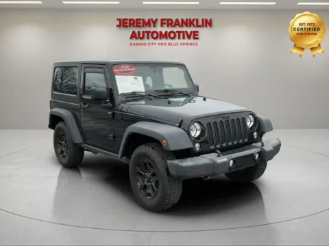 Black 2016 Jeep Wrangler Willys Wheeler for sale in Blue Springs, MO