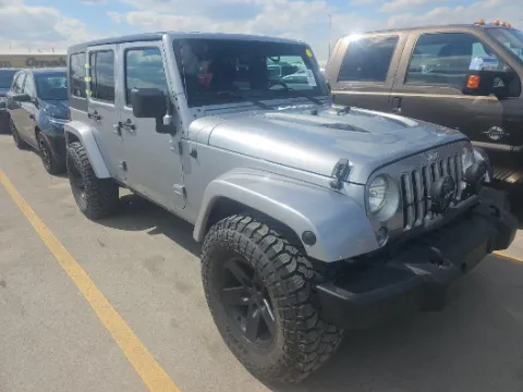 Silver 2017 Jeep Wrangler Unlimited Sahara for sale in Blue Springs, MO