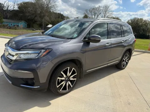 Photos of 2022 Honda Pilot Touring for sale in Deridder, LA at Hixson Toyota
