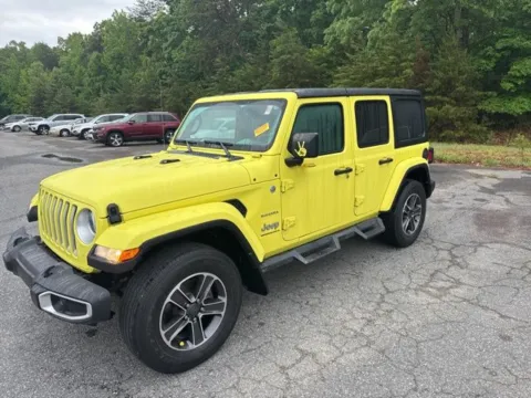 Yellow 2023 Jeep Wrangler Sahara for sale in Eden, NC