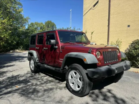 Red 2012 Jeep Wrangler Unlimited Sport SUV 4D for sale in Ashland, KY