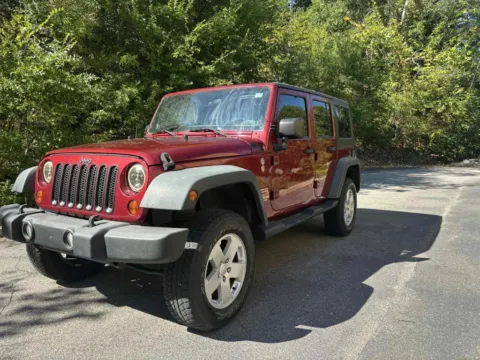 Another view of 2012 Jeep Wrangler Unlimited Sport SUV 4D for sale in Ashland, KY at Instant Auto Sales Ashland