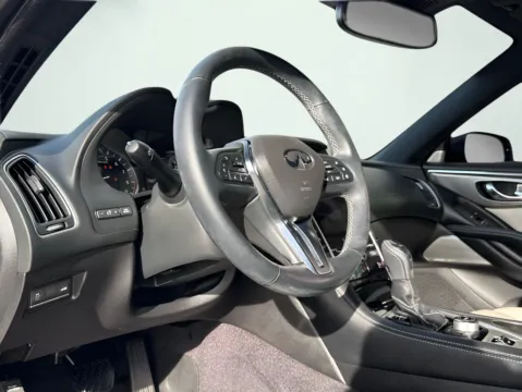 Photos of 2022 INFINITI Q60 LUXE for sale in Fishers, IN at AutoGiant USA Fishers