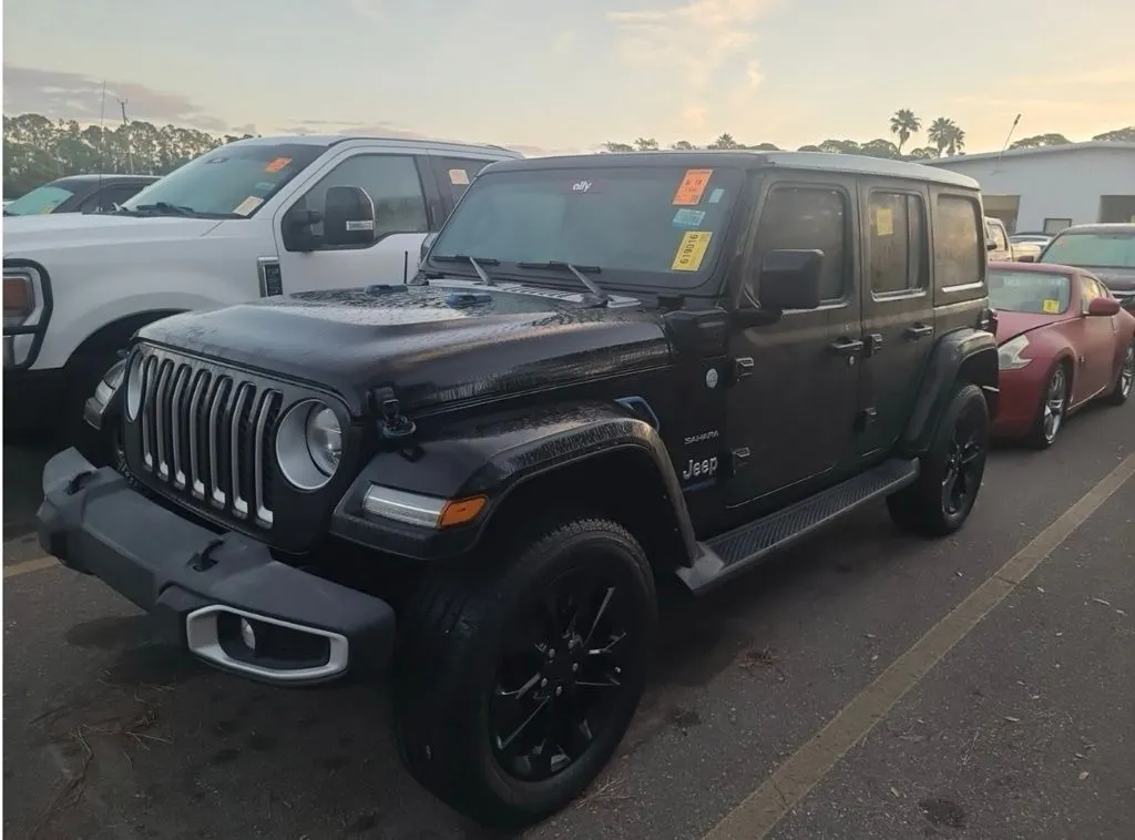 Black 2021 Jeep Wrangler Unlimited Sahara 4xe for sale in Fishers, IN