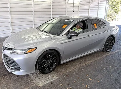 Silver 2018 Toyota Camry LE for sale in Fishers, IN