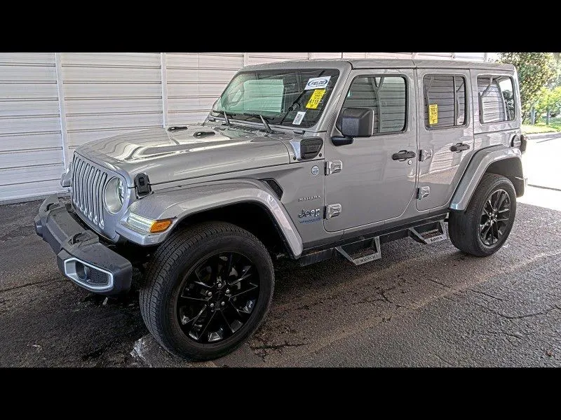 Silver 2021 Jeep Wrangler Unlimited Sahara 4xe for sale in Fishers, IN