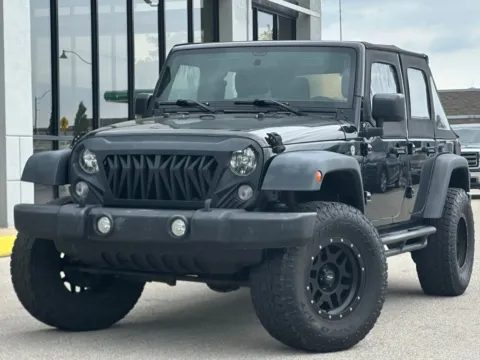 Black 2016 Jeep Wrangler Unlimited Sport for sale in Fishers, IN