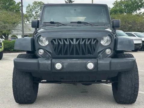 Photos of 2016 Jeep Wrangler Unlimited Sport for sale in Fishers, IN at AutoGiant USA Fishers
