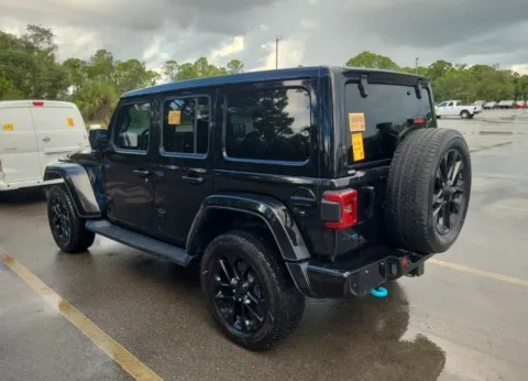 Photos of 2021 Jeep Wrangler Unlimited Sahara High Altitude 4xe for sale in Fishers, IN at AutoGiant USA Fishers