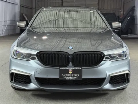 Another view of 2020 BMW 5 Series M550i xDrive for sale in Denver, CO at Automotive Imports Sales & Service