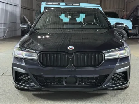 Photos of 2022 BMW 5 Series M550i xDrive for sale in Denver, CO at Automotive Imports Sales & Service