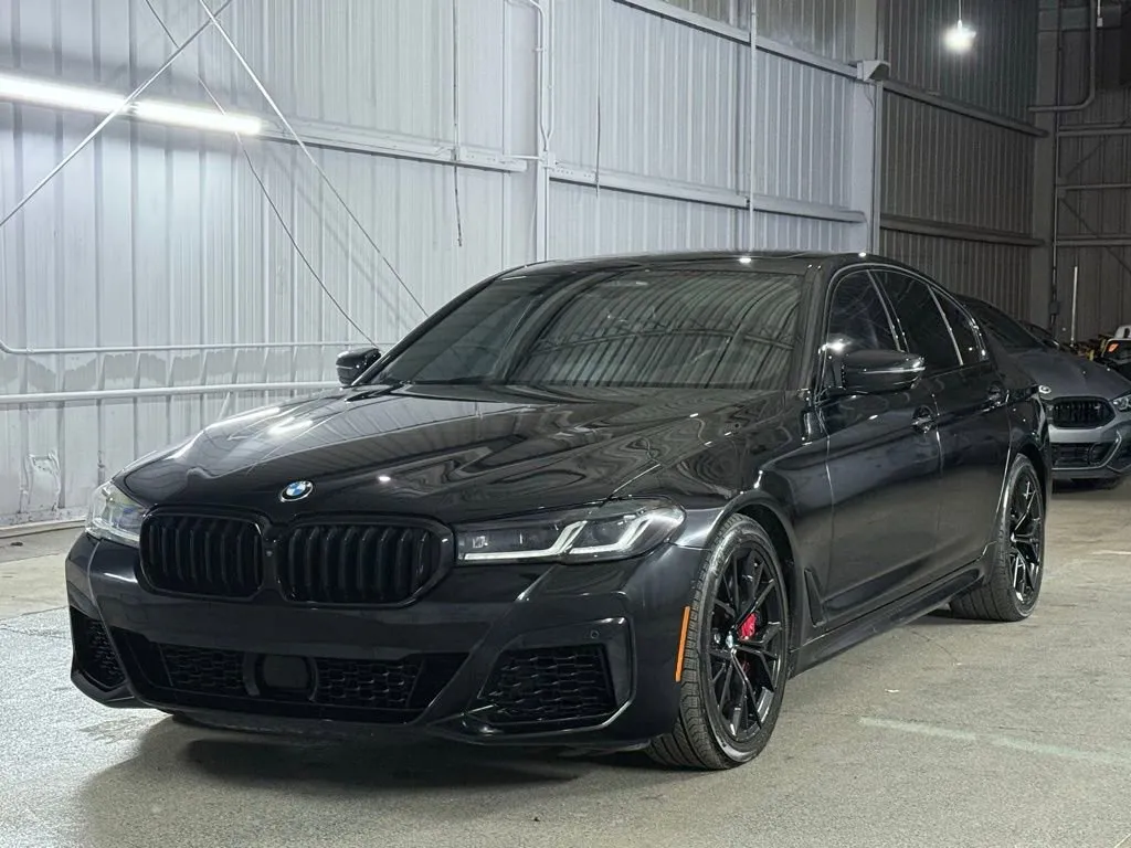 Black 2023 BMW 5 Series M550i xDrive for sale in Denver, CO