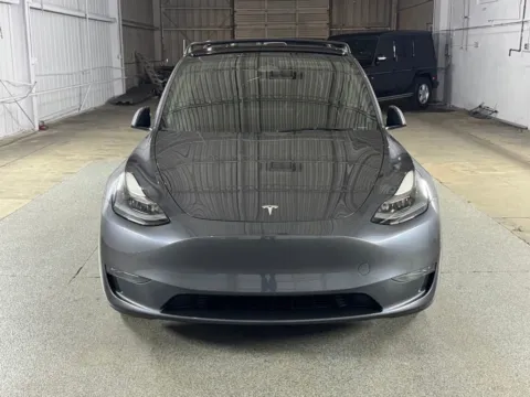 Photos of 2023 Tesla Model Y Performance for sale in Denver, CO at Automotive Imports Sales & Service