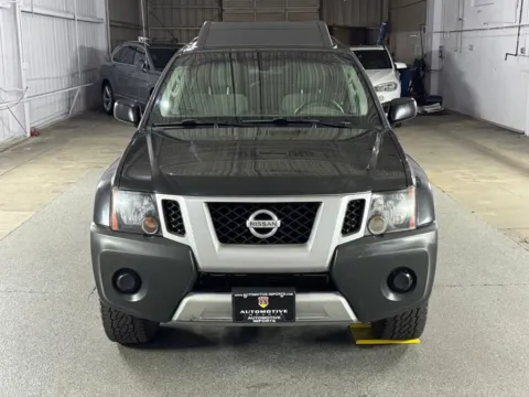 Photos of 2014 Nissan Xterra X for sale in Denver, CO at Automotive Imports Sales & Service