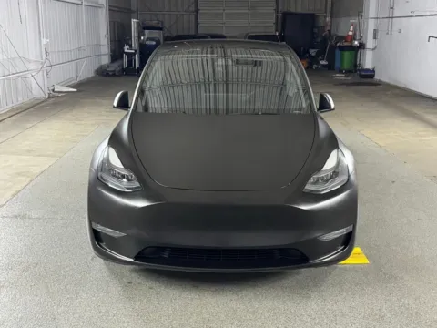 Photos of 2024 Tesla Model Y Performance for sale in Denver, CO at Automotive Imports Sales & Service