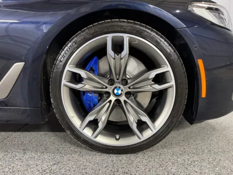 Another view of 2023 BMW 5 Series M550i xDrive for sale in Denver, CO at Automotive Imports Sales & Service