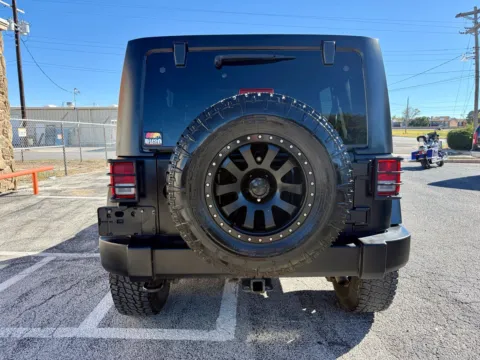 More photos of 2013 Jeep Wrangler Unlimited Sport at BISON AUTO, TX