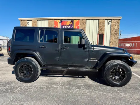 Photos of 2013 Jeep Wrangler Unlimited Sport for sale in Abilene, TX at BISON AUTO