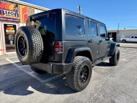 Another view of 2013 Jeep Wrangler Unlimited Sport for sale in Abilene, TX at BISON AUTO
