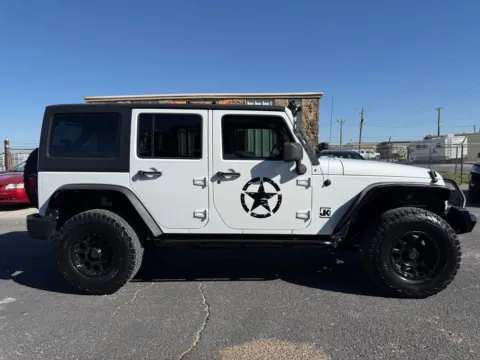 Photos of 2012 Jeep Wrangler Unlimited Sport for sale in Abilene, TX at BISON AUTO