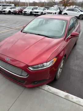 Red 2015 Ford Fusion SE for sale in Davison, MI