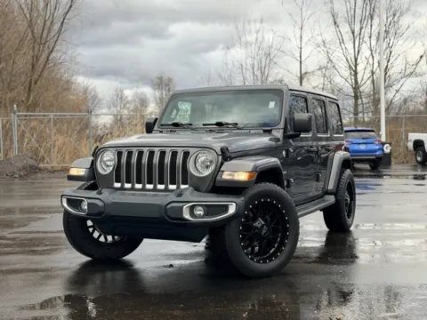 Gray 2018 Jeep Wrangler Unlimited Sahara for sale in Davison, MI