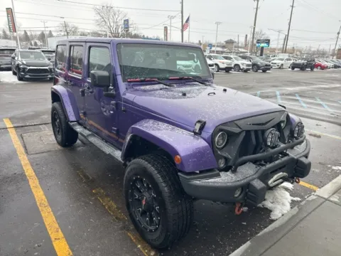 Purple 2016 Jeep Wrangler Unlimited Sahara for sale in Davison, MI