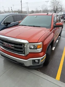 Orange 2015 GMC Sierra 1500 SLE for sale in Davison, MI