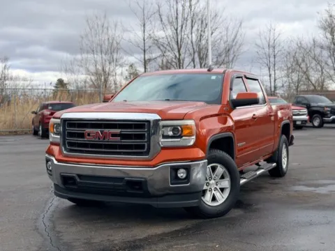Orange 2015 GMC Sierra 1500 SLE for sale in Davison, MI