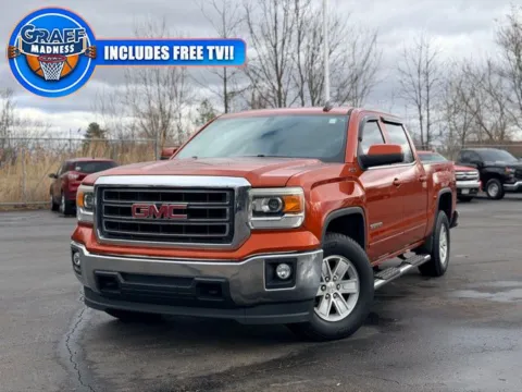 Orange 2015 GMC Sierra 1500 SLE for sale in Davison, MI