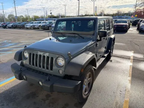 Gray 2015 Jeep Wrangler Unlimited Sport for sale in Davison, MI