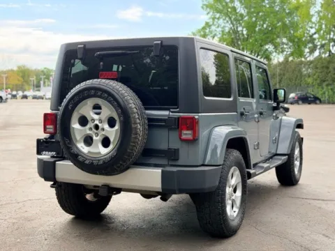 Another view of 2014 Jeep Wrangler Unlimited Sahara for sale in Davison, MI at Hank Graff Chevrolet Davison